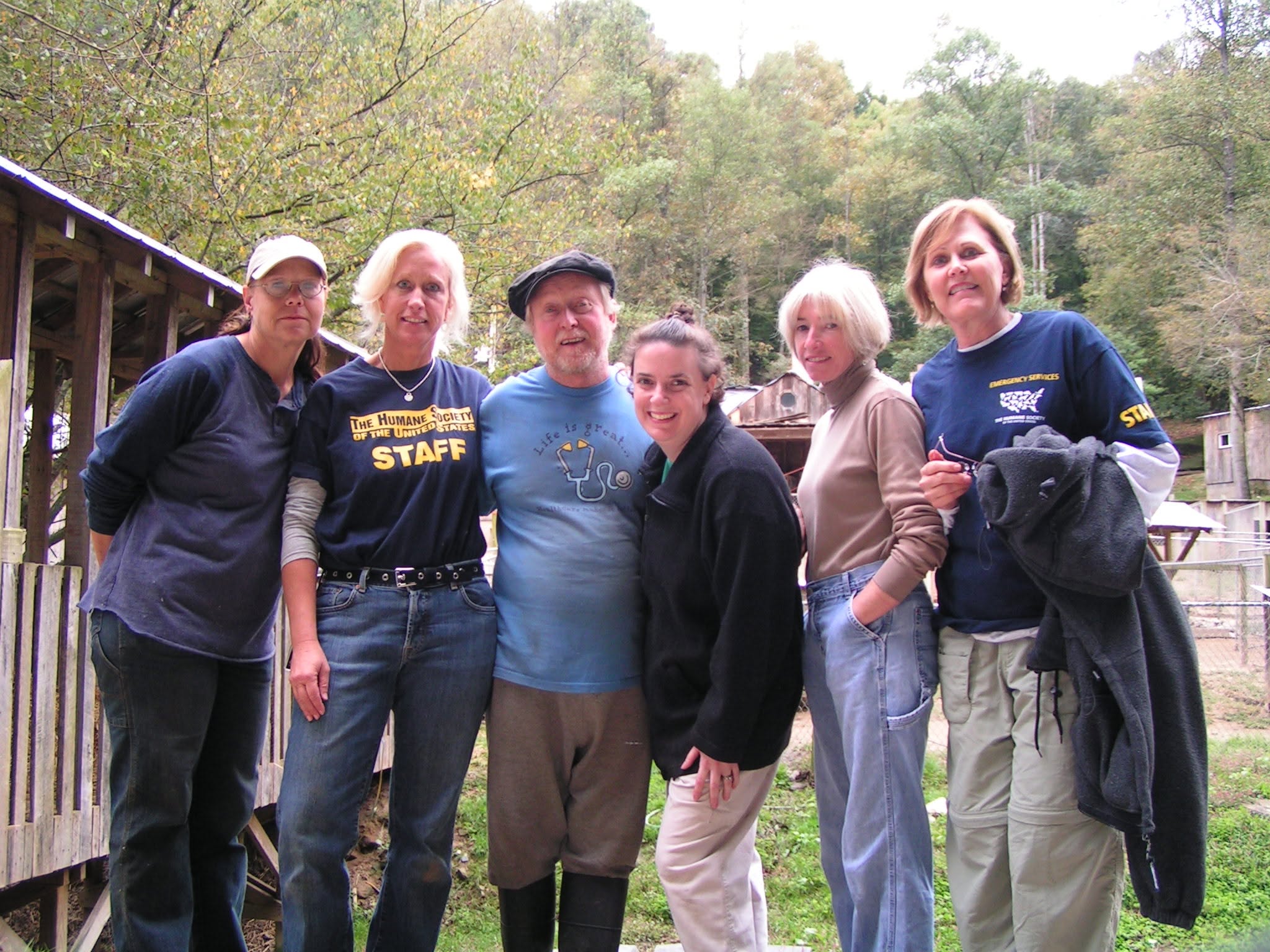 A group of people posing together at the sanctuary.